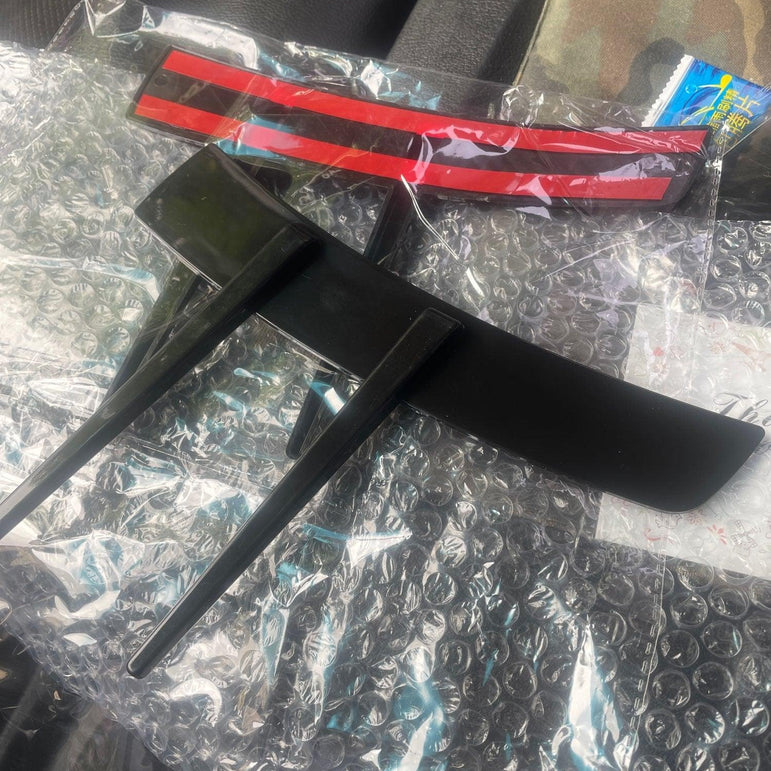 Side lips for the front bumper